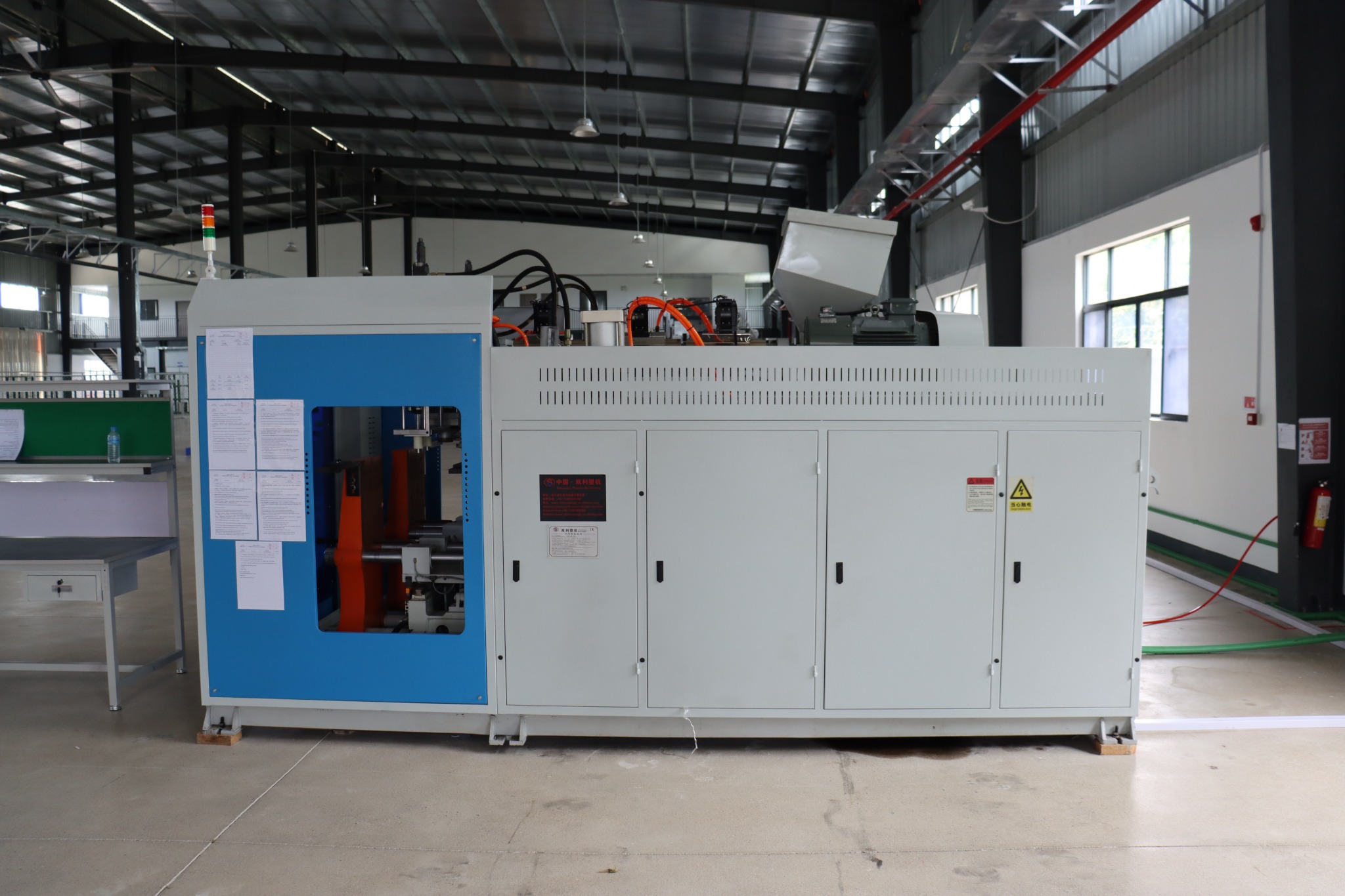 Close view of equipment in the injection molding workshop